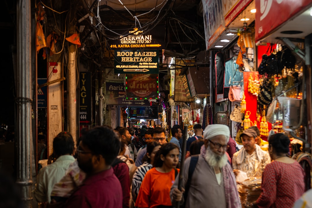 Crowded street market with shops and people
